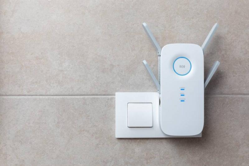 Wifi extender plugged into wall.