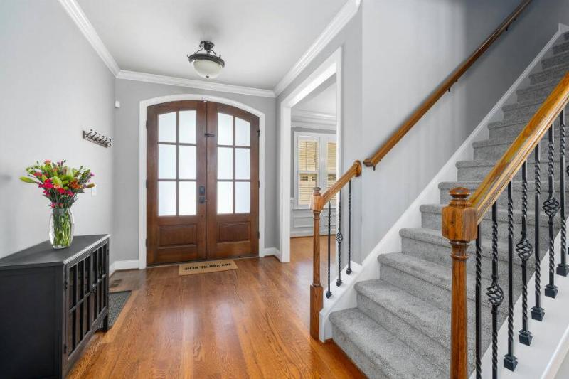 Entryway in house with stairs.