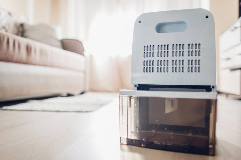 Dehumidifier with open water container.