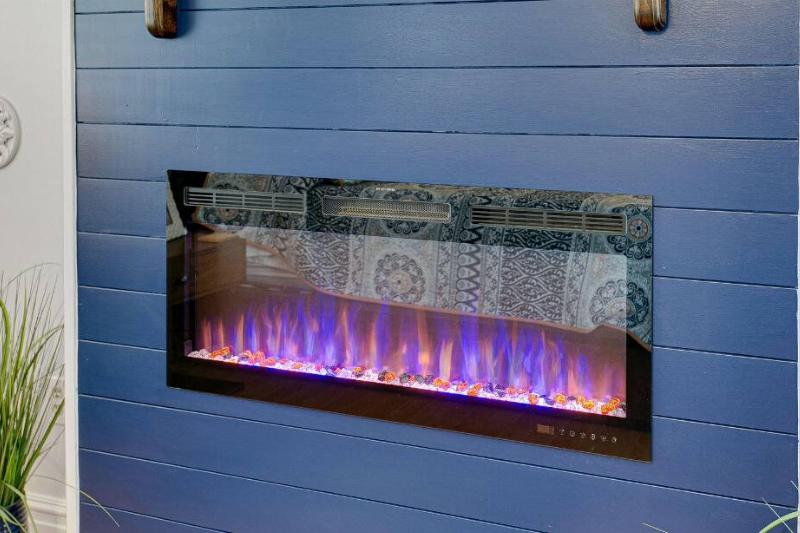 Blue flames from a gas fireplace.