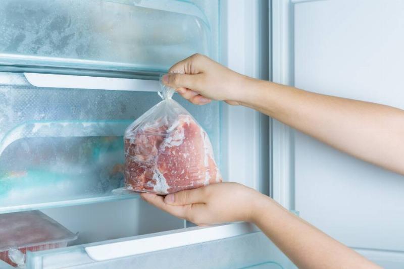 Old food going in freezer, not garbage. 