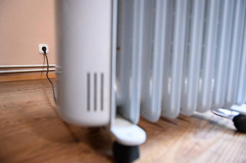 Space heater plugged into the wall.