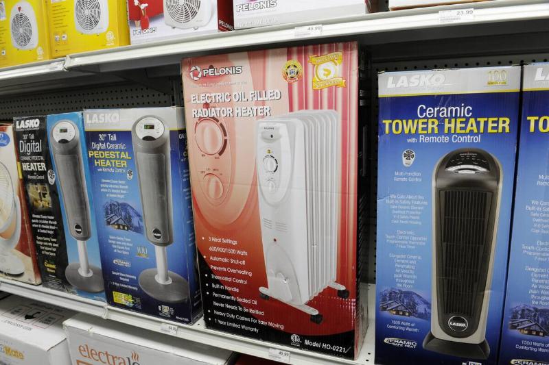 Space heaters on a store shelf.