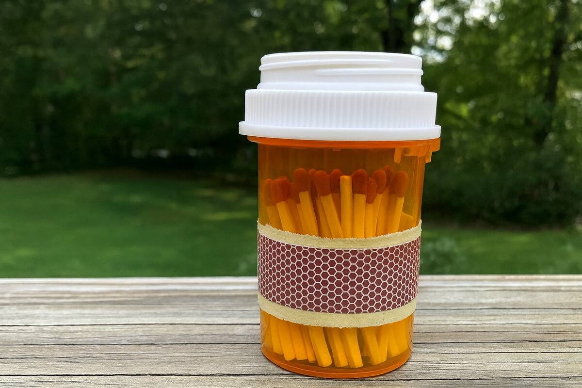 Matches stored in a pill bottle. 