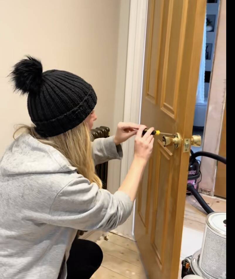 Tara working on home renovations.