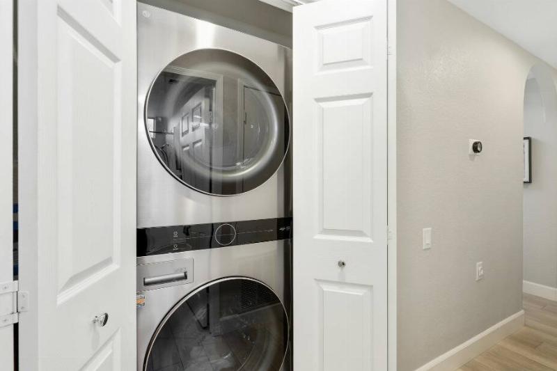 Washer and dryer in a closet. 