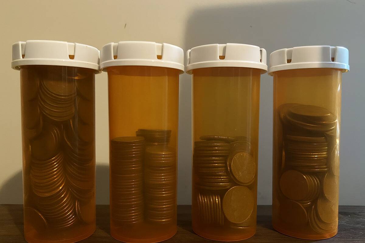 Pill bottles being used to store loose change. 