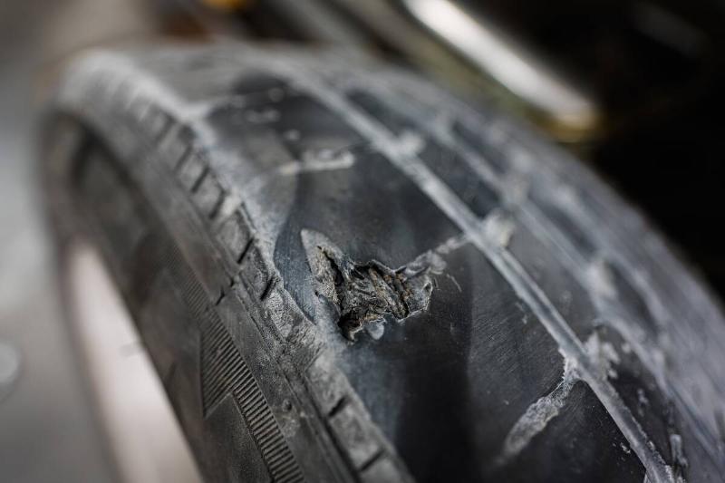 Tire with tread damage. 