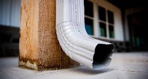 Sick of Looking At That Ugly Downspout? Here’s How To Make It Blend In Beautifully