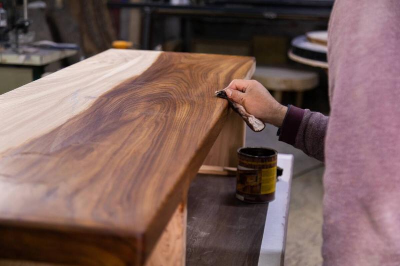 Oiling wood table. 
