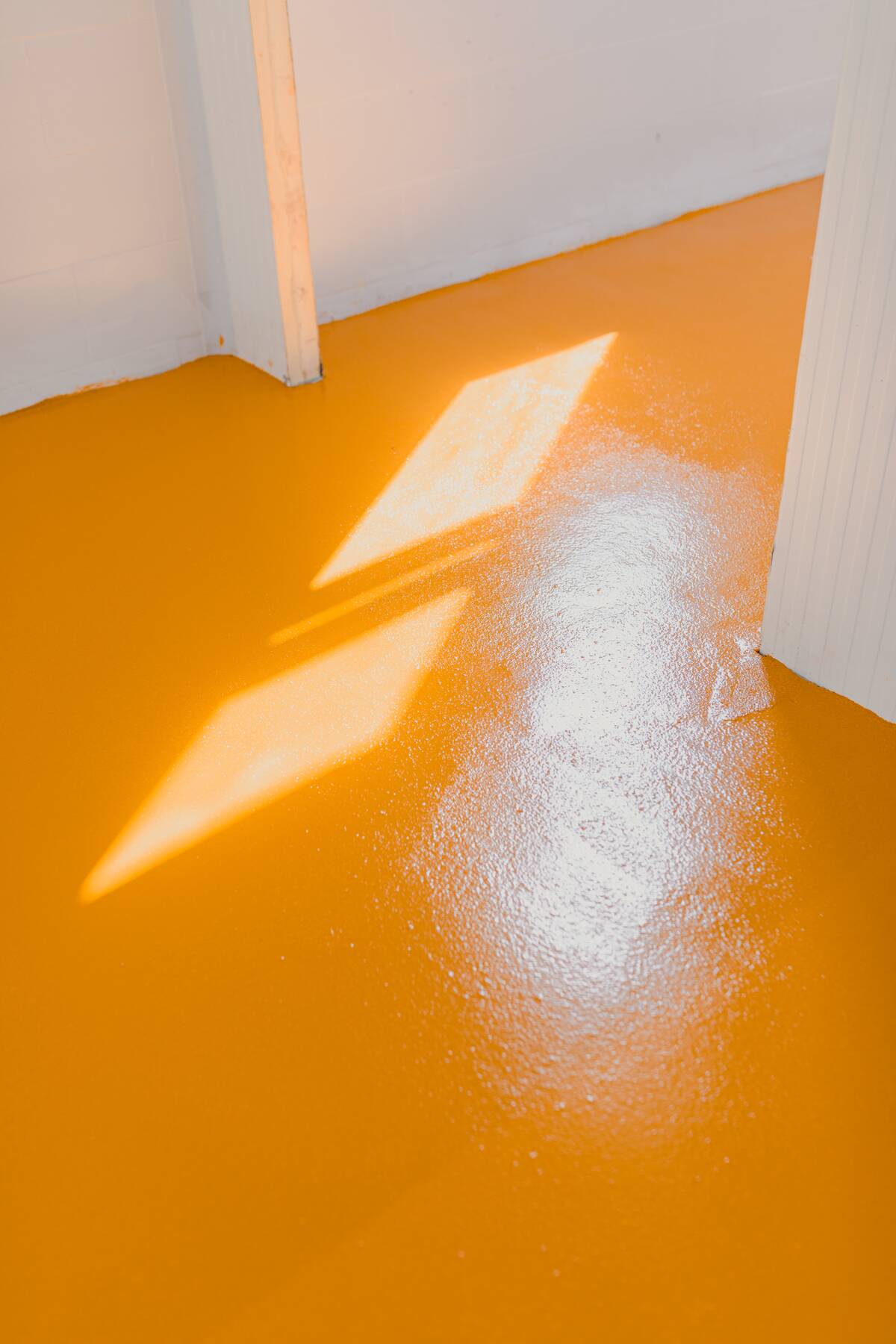 White powder on an orange floor. 