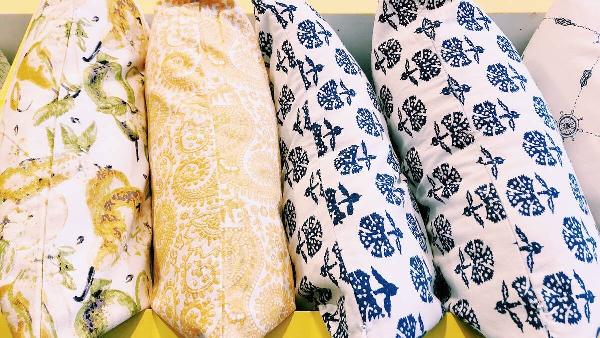 Yellow and blue cotton pillows. 