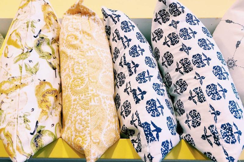 Yellow and blue cotton pillows. 