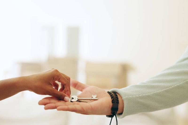 hands-moving-and-key-by-handing-over-in-new-home-2023-11-27-05-29-12-utc-34203-43571