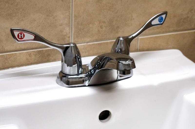 Faucet in bathroom sink. 