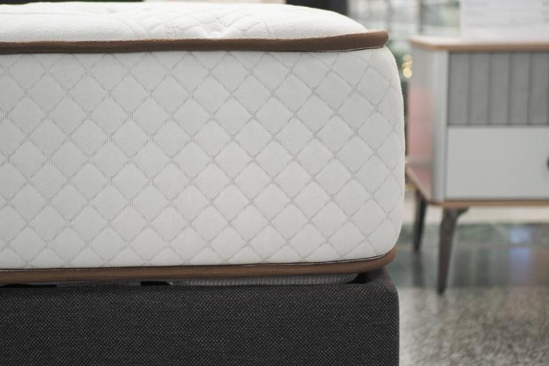 A thick mattress on display in a store. 