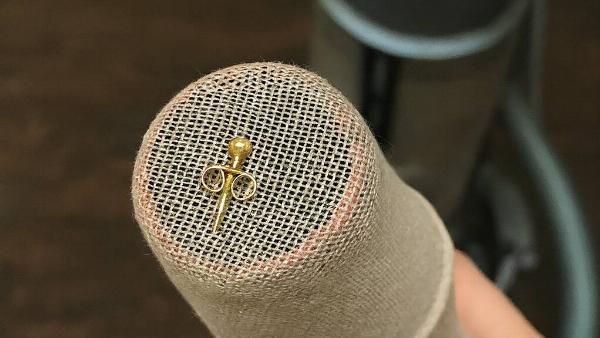 A stocking over the end of a vacuum hose that caught an earring. 