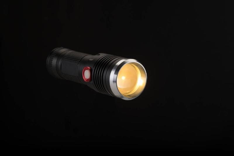 Flashlight on a black background. 