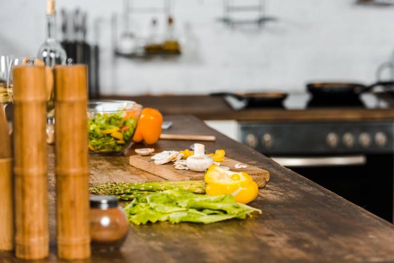 Butcher block counter top in kitchen. 