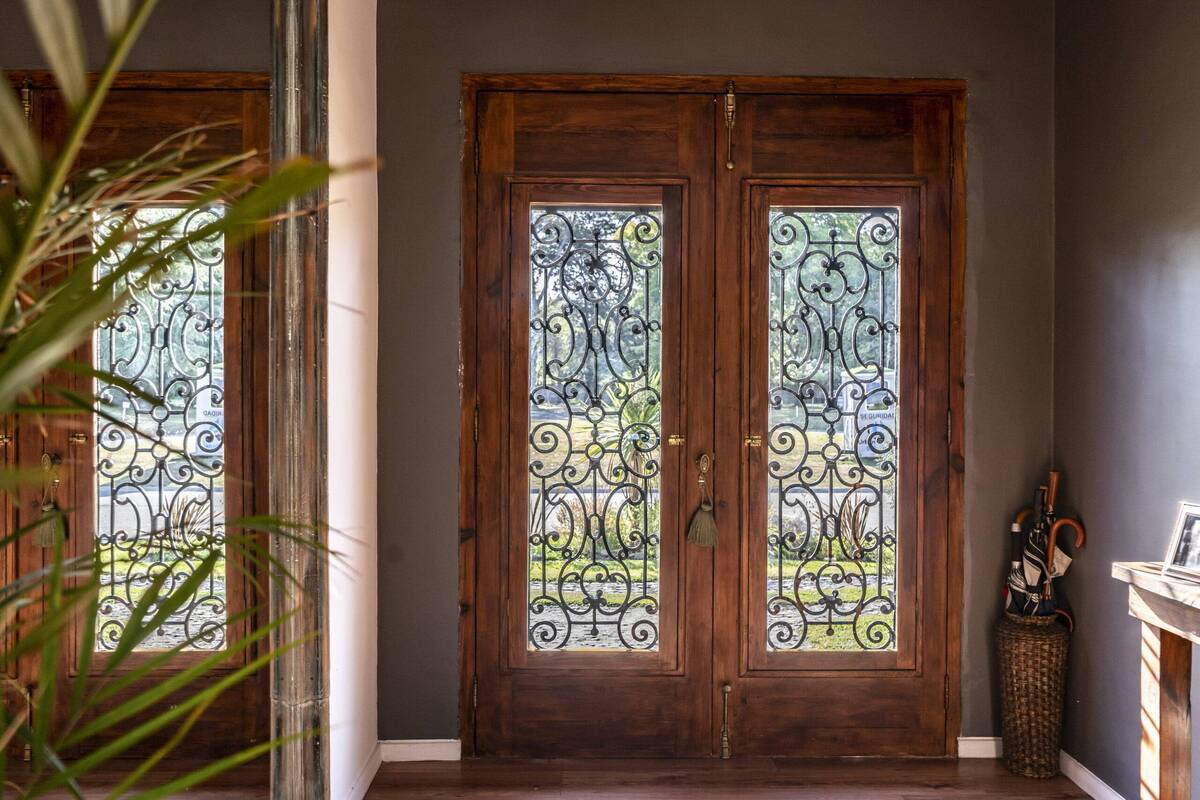 view-of-a-trendy-wooden-front-door-from-the-inside-2025-03-11-18-53-22-utc-38414-scaled-1-24017