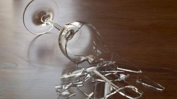 Broken glass on the floor.