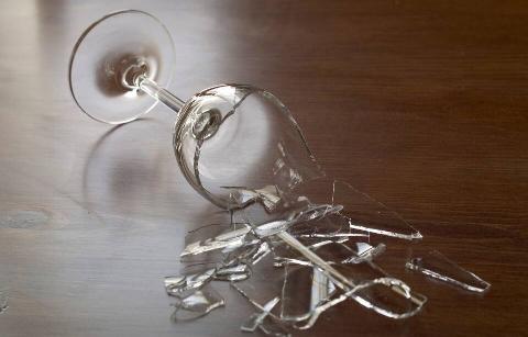 Broken glass on the floor.