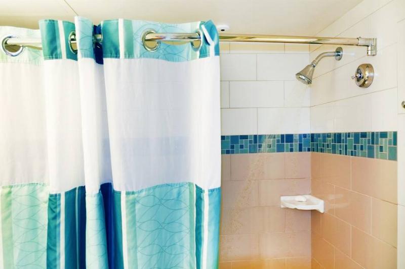 A shower curtain on a shower.