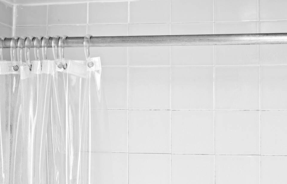 A plastic shower curtain liner.