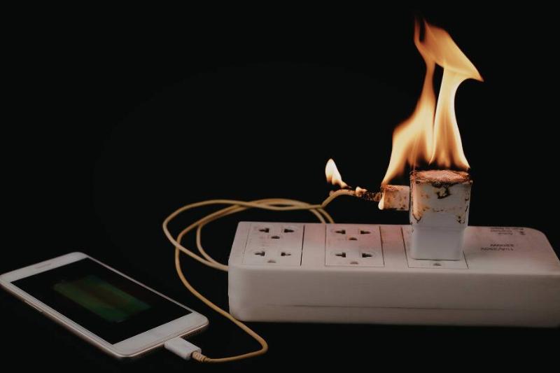Phone charger on fire. 