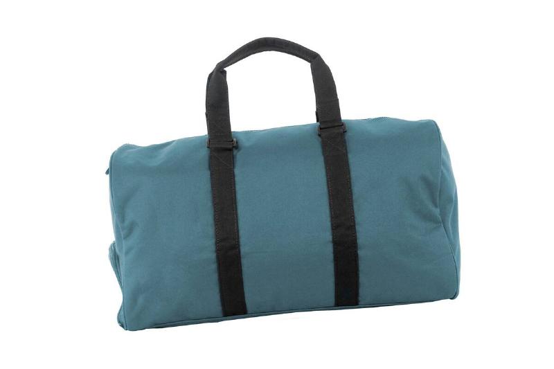 Blue storage bag for storing Christmas trees. 