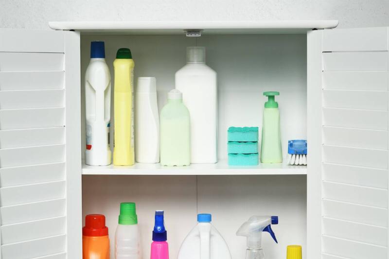 Cabinet with different cleaning products.