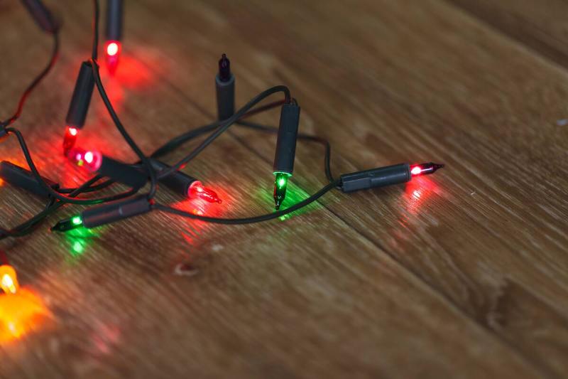 Colorful Christmas lights on the floor. 