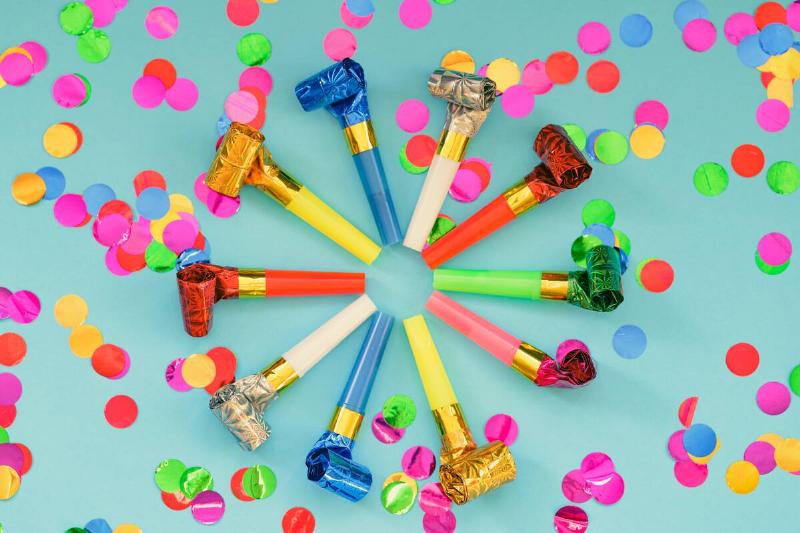 Noisemakers laid in a circle. 