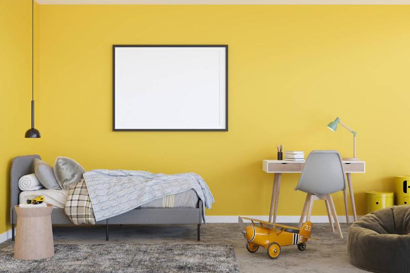 A bright yellow bedroom. 