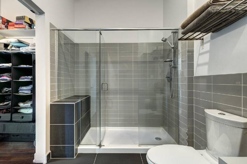 Zero-threshold shower in modern bathroom. 