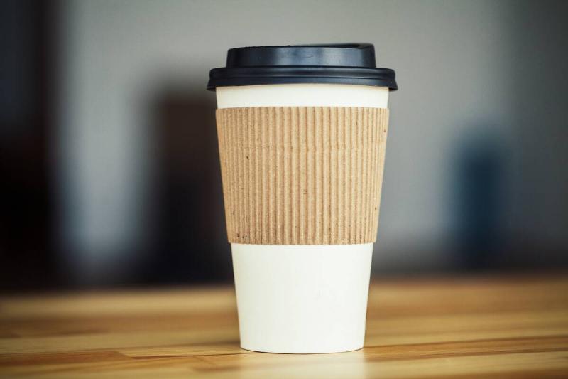 Disposable paper coffee cup.