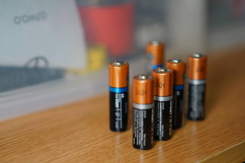 Batteries on a table. 