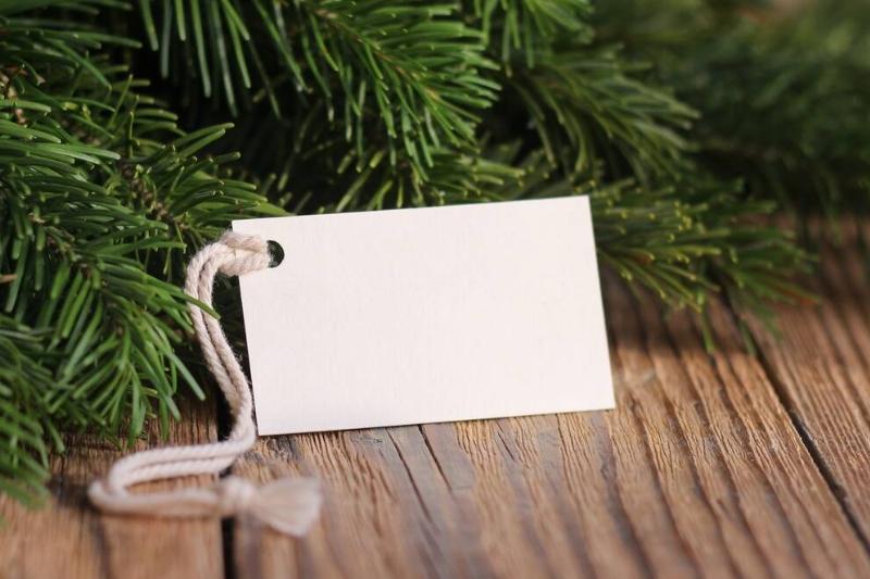 Small label close to Christmas tree.