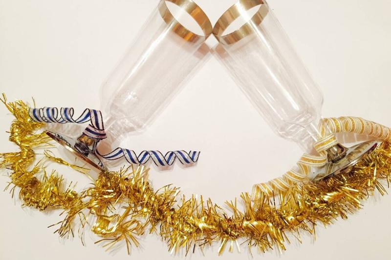 Two plastic champaign flutes. 