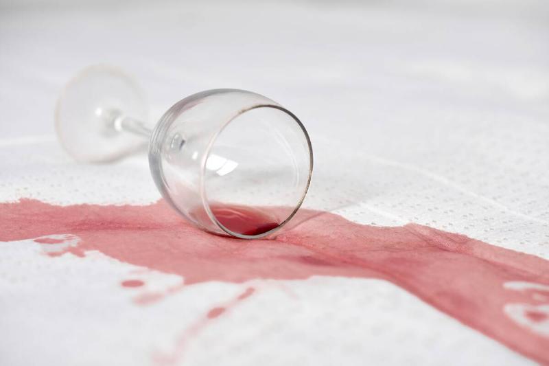 Spilled glass of red wine. 