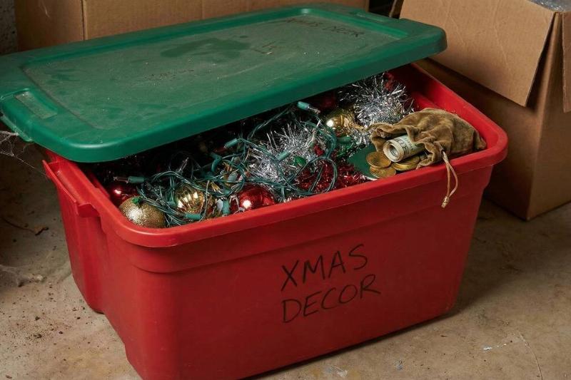A bin or Christmas decor that is also hiding a small pouch of valuables. 