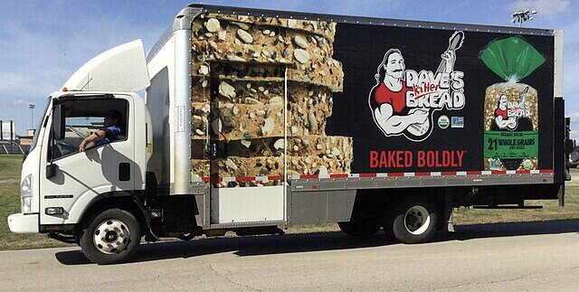 Dave's Killer Bread delivery truck parked on the side of a road