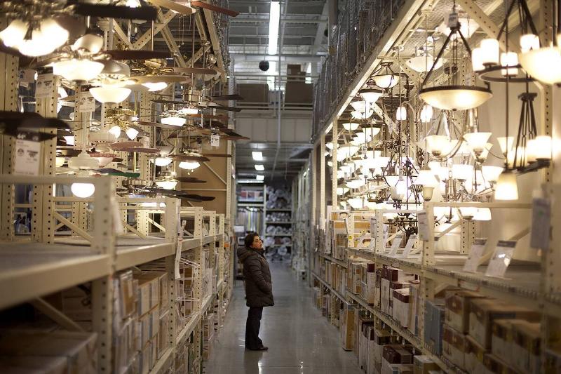 A customer shops for lighting fixtures at a Home Depot Inc. store.