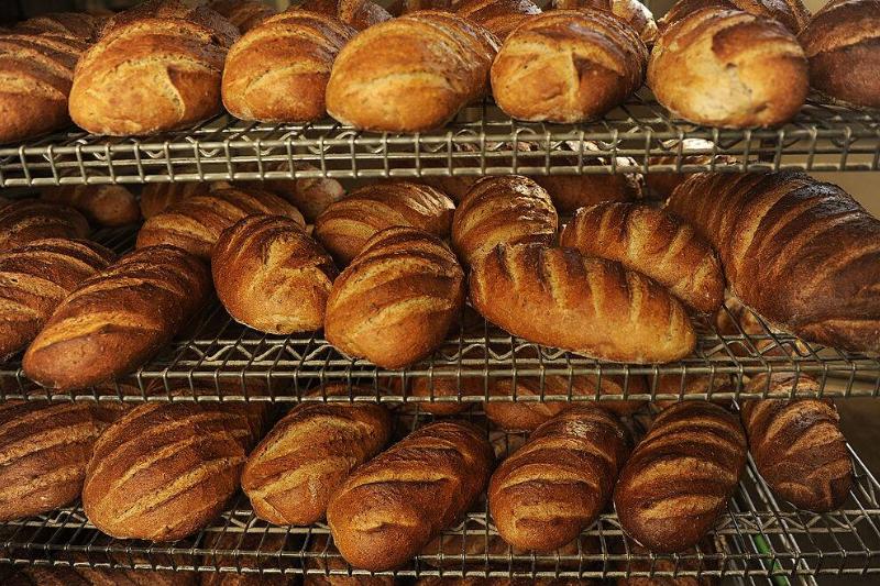 Loaves of bread on cooling racks