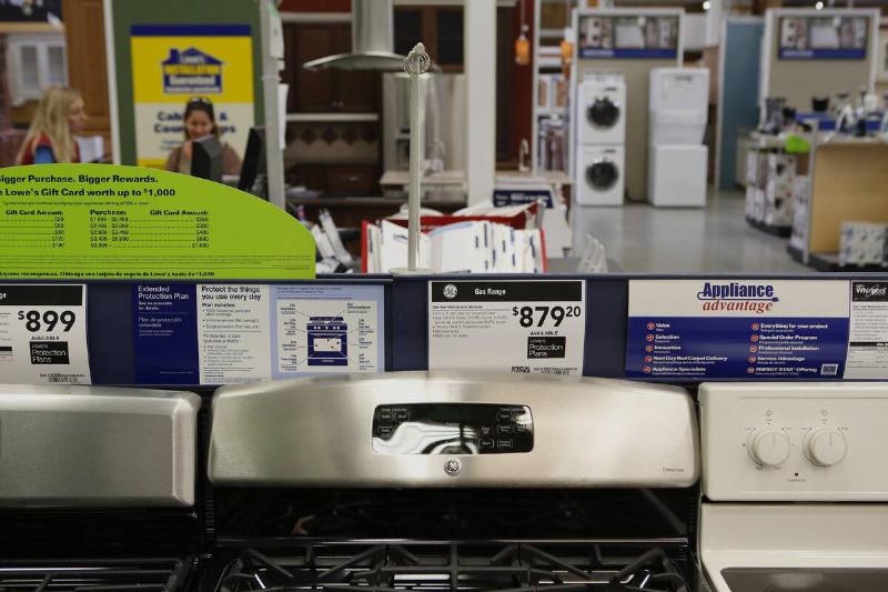 A General Electric Co. (GE) gas range, center, is displayed for sale at a Lowe's Cos. store.