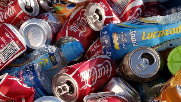Soft drink cans and bottles ready for re-cycling, UK.