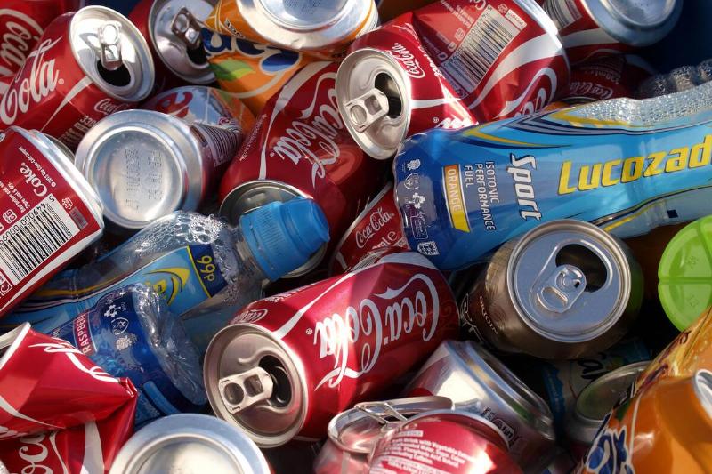 Soft drink cans and bottles ready for re-cycling, UK.