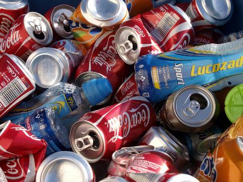 Soft drink cans and bottles ready for re-cycling, UK.