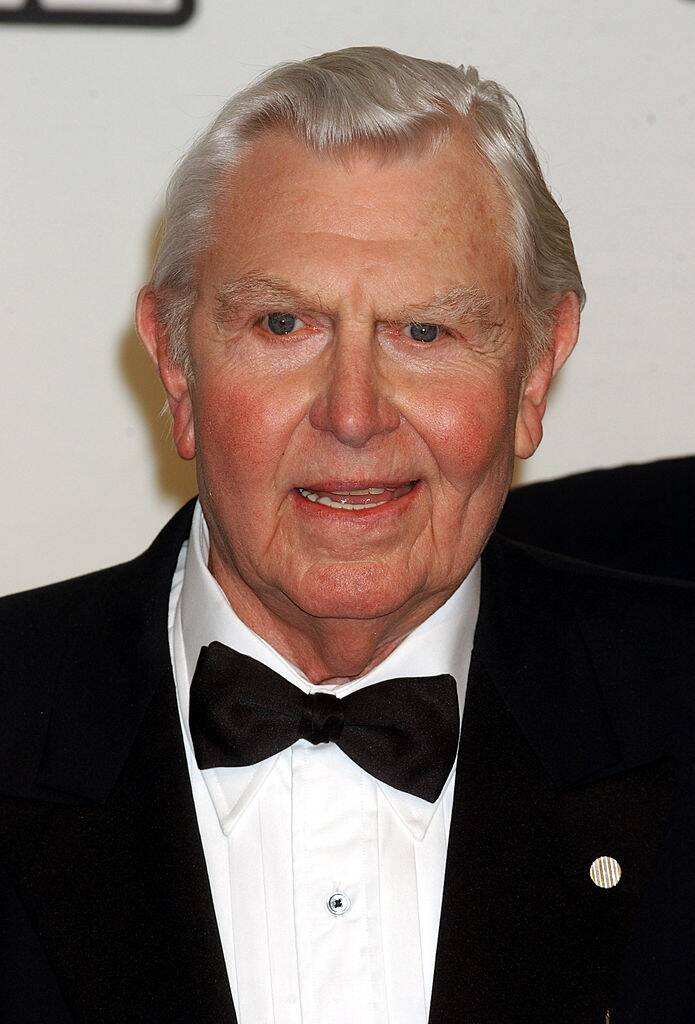 Andy Griffith standing on a red carpet