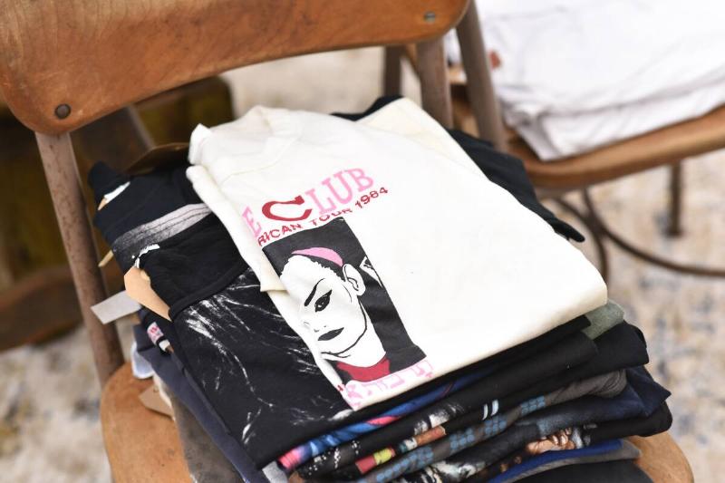 Vintage band T-shirts on a chair. 